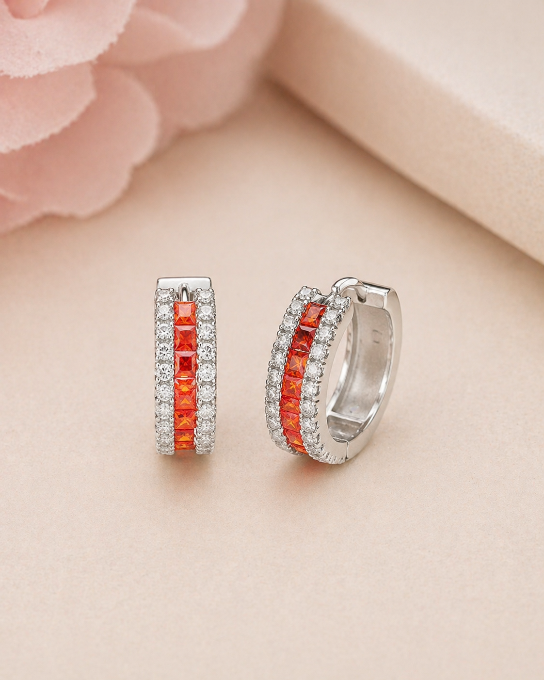 Silver earrings with orange stones