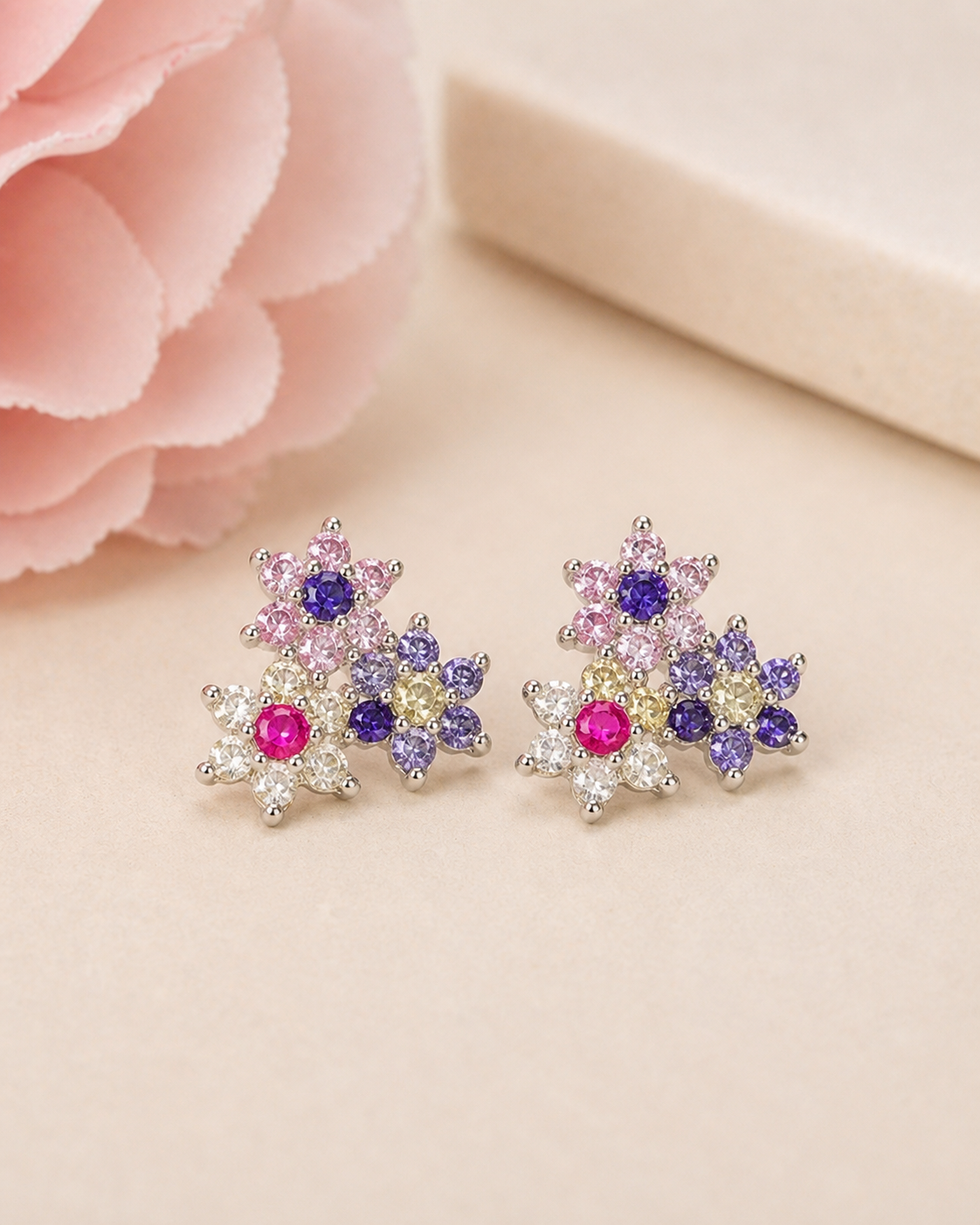 Silver earrings in flower design